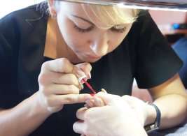 nail tech working